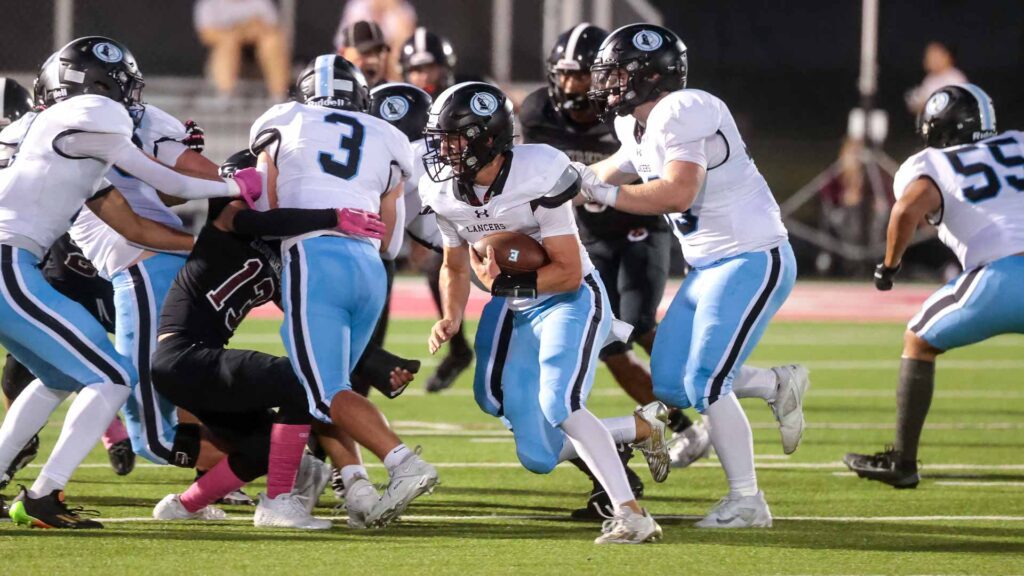 Lawrence High football vs. Shawnee MIssion East, Week 5-24