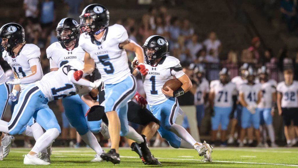 Lawrence High football vs. Shawnee MIssion East, Week 5-35