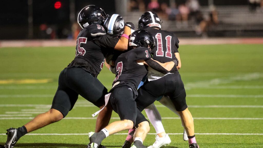 Lawrence High football vs. Shawnee MIssion East, Week 5-38