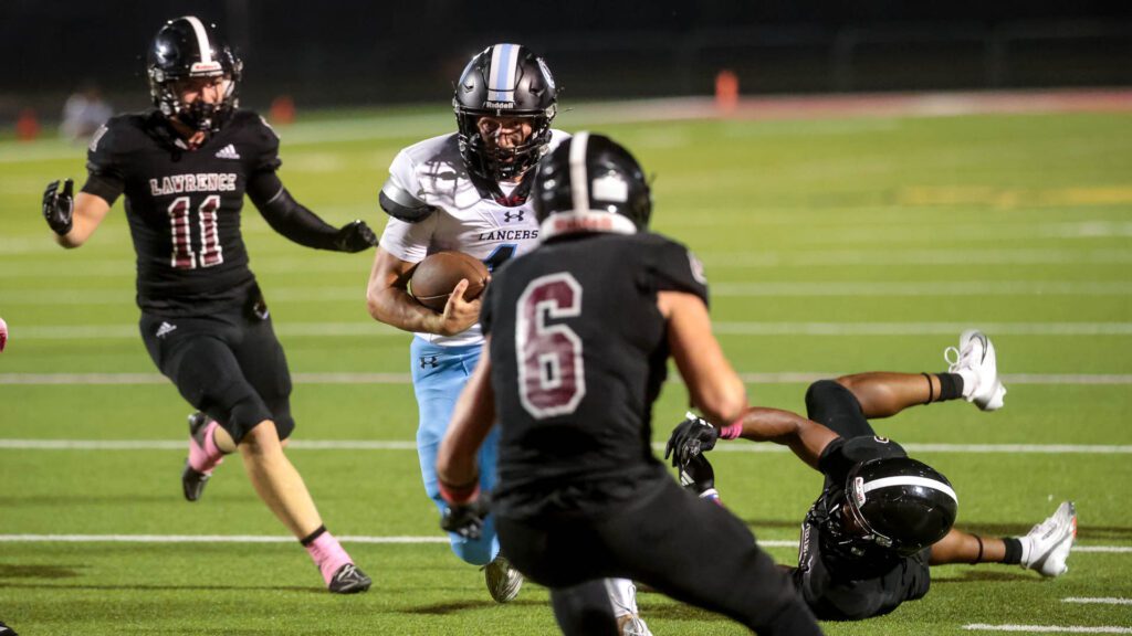 Lawrence High football vs. Shawnee MIssion East, Week 5-40