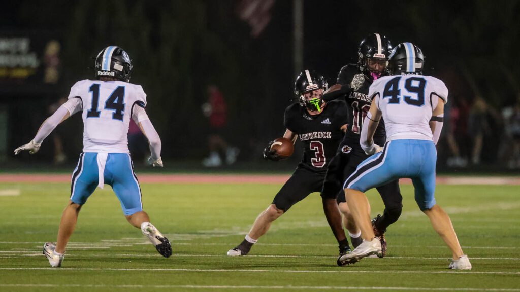 Lawrence High football vs. Shawnee MIssion East, Week 5-45