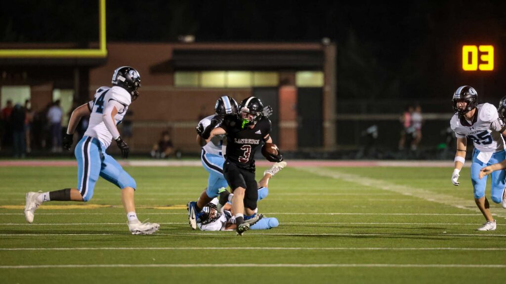 Lawrence High football vs. Shawnee MIssion East, Week 5-49