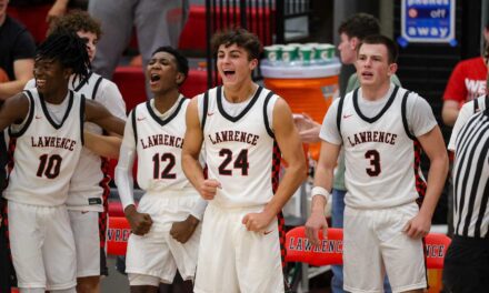 Dooley, Simien lead Lawrence boys basketball past KC East, 65-51