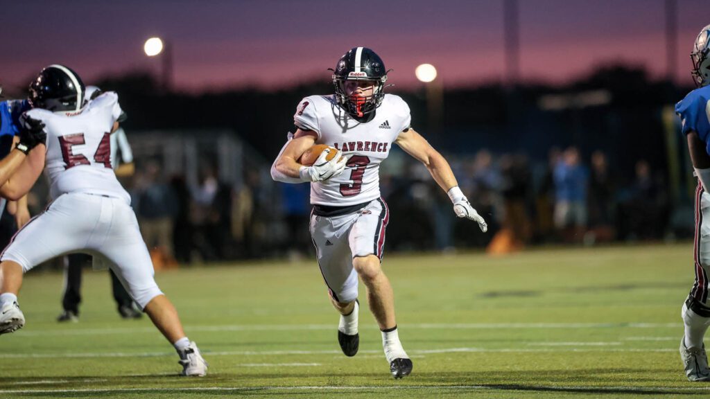 Lawrence High football vs. Olathe West, Week 1-17